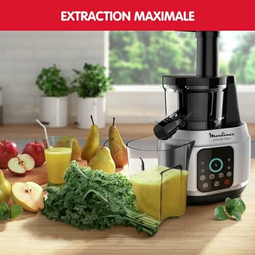 Extracteur de jus Moulinex avec fruits et légumes.